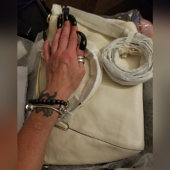 Coach - Picture 2 of 7